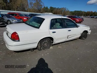 2000 Ford Crown Victoria LX z VIN 2FAFP74W0YX125595, wystawiony jako Copart lot #84675434 z przebiegiem 151 438 mil mil oraz Szkoda całkowita • Salvage title. Historia ofert i sprzedaży dostępna na DreamBid. Obrazek 3.