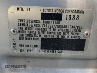 1988 Toyota Camry z VIN JT2SV24E5J3276324, wystawiony jako Copart lot #88117355 z przebiegiem 89 928 mil mil oraz Szkoda całkowita • Salvage title. Historia ofert i sprzedaży dostępna na DreamBid. Obrazek 12.