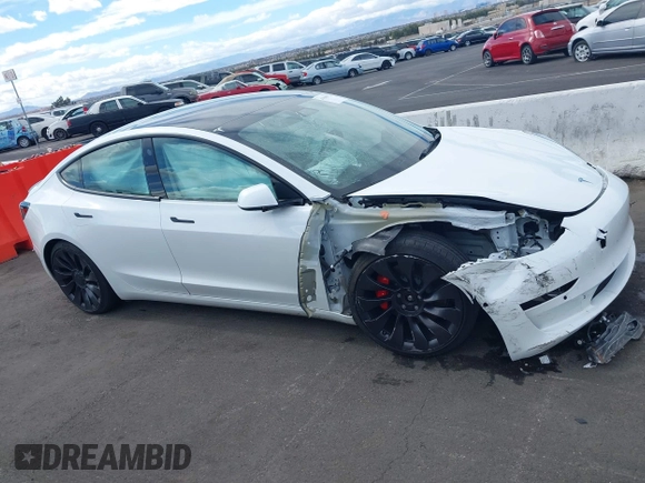 2022 Tesla Model 3 Performance with VIN 5YJ3E1EC6NF111958, listed as a IAAI auction lot 41583972 with 28,431 mi miles and . Bid and sale history available at DreamBid. Image 12.