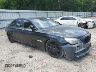 2014 BMW 7 Series 740Li with VIN WBAYE4C53ED137952, listed as a Copart auction lot 62829515 with 151,160 mi miles and Salvage title. Bid and sale history available at DreamBid. Image 4.