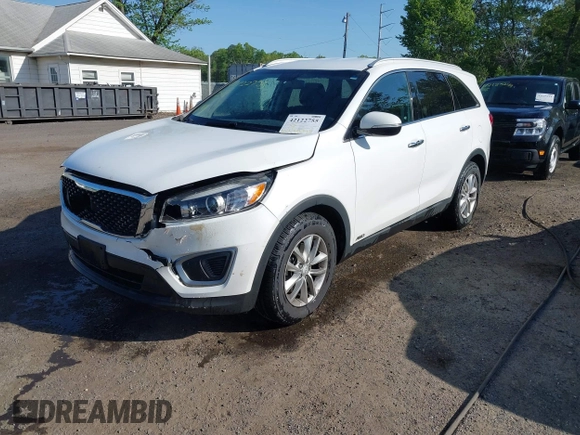2017 Kia Sorento LX with VIN 5XYPGDA54HG187891, listed as a IAAI auction lot 42122755 with 143,131 mi miles and . Bid and sale history available at carsss.com. Image 2.