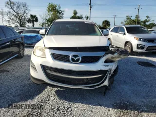 2012 Mazda CX-9 Touring z VIN JM3TB2CA7C0344329, wystawiony jako Copart lot #51869975 z przebiegiem 216 114 mil mil oraz Szkoda całkowita • Salvage title. Historia ofert i sprzedaży dostępna na DreamBid. Obrazek 5.