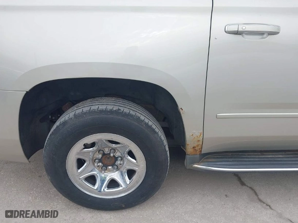 2015 Chevrolet Suburban LTZ with VIN 1GNSKKKC0FR525772, listed as a IAAI auction lot 41745084 with 187,981 mi miles. Bid and sale history available at carsss.com. Image 6.