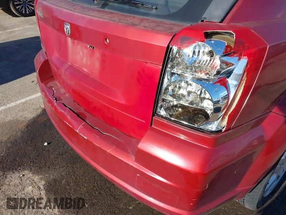 2008 Dodge Caliber SE with VIN 1B3HB28C78D660078, listed as a IAAI auction lot 40999360 with 174,027 mi miles. Bid and sale history available at carsss.com. Image 12.