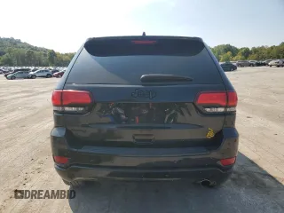 2018 Jeep Grand Cherokee Laredo E with VIN 1C4RJFAG9JC390597, listed as a Copart auction lot 71450474 with 69,645 mi miles and Salvage title. Bid and sale history available at DreamBid. Image 6.
