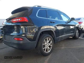 2015 Jeep Cherokee Latitude with VIN 1C4PJLCB7FW632624, listed as a IAAI auction lot 41413648 with 110,274 mi miles. Bid and sale history available at carsss.com. Image 4.