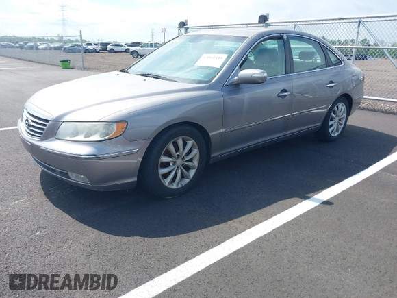 2007 Hyundai Azera SE with VIN KMHFC46F47A149693, listed as a IAAI auction lot 42060439 with 190,317 mi miles and . Bid and sale history available at DreamBid. Image 2.