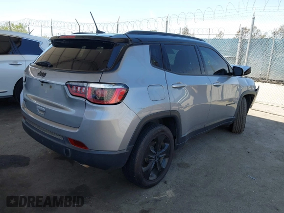 2019 Jeep Compass Latitude with VIN 3C4NJDBB4KT754484, listed as a IAAI auction lot 42324284 with 85,637 mi miles and . Bid and sale history available at DreamBid. Image 4.