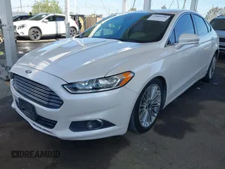 2013 Ford Fusion SE Hybrid z VIN 3FA6P0LU1DR310075, wystawiony jako IAAI lot #42085556 z przebiegiem Nie podano mil oraz . Historia ofert i sprzedaży dostępna na DreamBid. Obrazek 2.