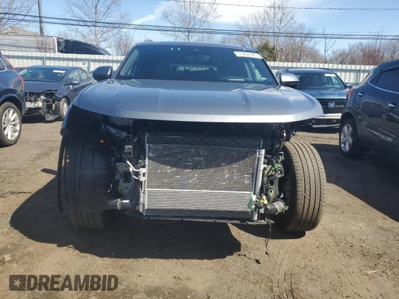 2024 Volkswagen Atlas SEL Premium R-Line with VIN 1V2FE2CA8RC209296, listed as a Copart auction lot 51262385 with 10,914 mi miles and Salvage title. Bid and sale history available at DreamBid. Image 5.