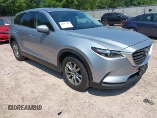 2017 Mazda CX-9 Touring with VIN JM3TCBCY0H0140201, listed as a IAAI auction lot 42657422 with 142,194 mi miles and . Bid and sale history available at DreamBid. Image 1.