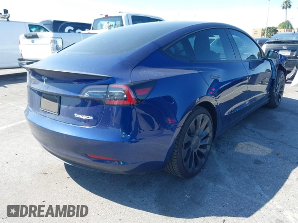 2022 Tesla Model 3 Performance with VIN 5YJ3E1EC5NF315764, listed as a IAAI auction lot 41760552 with 22,354 mi miles and . Bid and sale history available at carsss.com. Image 4.
