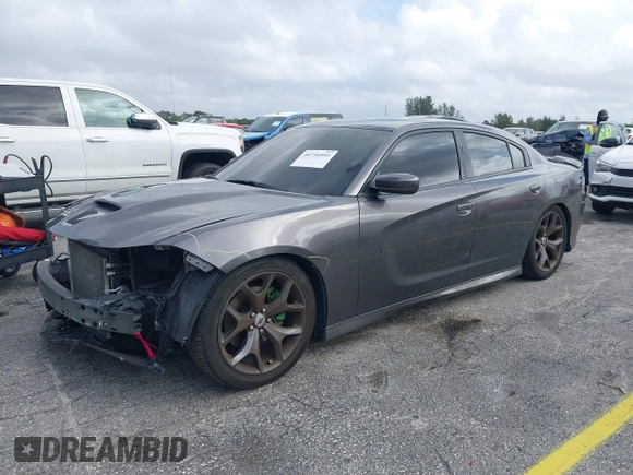 2019 Dodge Charger GT with VIN 2C3CDXHG6KH628451, listed as a IAAI auction lot 40750593 with 80,996 mi miles and . Bid and sale history available at DreamBid. Image 19.