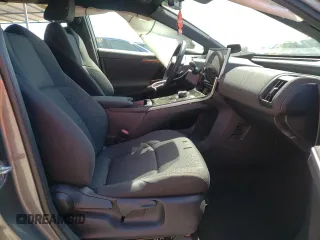 2023 Subaru Solterra Premium с VIN JTMABABA5PA027256, выставлен на аукционе Copart как лот 55825145 с пробегом 16 642 миль миль и На запчасти • Non repairable. История ставок и продаж доступна на DreamBid. Изображение 7.