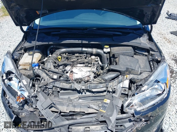 2018 Ford Focus SE z VIN 1FADP3FE5JL279274, wystawiony jako IAAI lot #42626587 z przebiegiem 92 110 mil mil oraz . Historia ofert i sprzedaży dostępna na DreamBid. Obrazek 10.