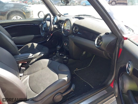 2011 MINI Cooper Convertible s with VIN WMWZP3C55BT249405, listed as a IAAI auction lot 41461640 with 59,856 mi miles. Bid and sale history available at carsss.com. Image 5.