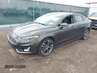 2019 Ford Fusion Titanium with VIN 3FA6P0K9XKR259556, listed as a IAAI auction lot 41823997 with 132,071 mi miles. Bid and sale history available at carsss.com. Image 17.