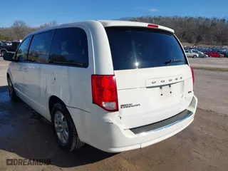 2012 Dodge Grand Caravan SE with VIN 2C4RDGBG1CR214990, listed as a IAAI auction lot 41737352 with 273,821 mi miles. Bid and sale history available at carsss.com. Image 3.