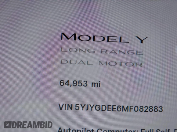 2021 Tesla Model Y Long Range with VIN 5YJYGDEE6MF082883, listed as a IAAI auction lot 42078807 with 64,953 mi miles. Bid and sale history available at carsss.com. Image 16.