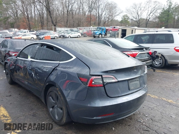 2019 Tesla Model 3 Mid Range with VIN 5YJ3E1EA3KF426971, listed as a IAAI auction lot 41564939 with Not Provided miles and . Bid and sale history available at carsss.com. Image 3.