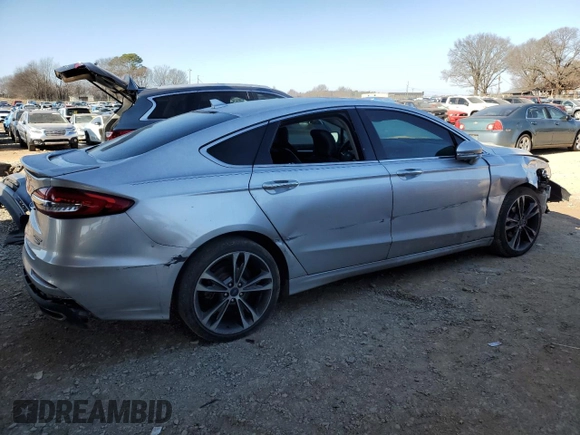 2019 Ford Fusion Titanium with VIN 3FA6P0D92KR141420, listed as a Copart auction lot 88300925 with 138,136 mi miles and Salvage Title. Bid and sale history available at carsss.com. Image 3.