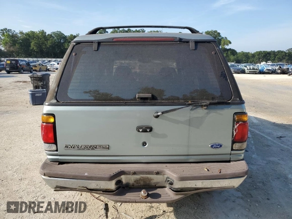 1996 Ford Explorer XL с VIN 1FMDU34X9TZA13792, выставлен на аукционе Copart как лот 58668525 с пробегом 123 231 миль миль и Списание • Salvage title. История ставок и продаж доступна на DreamBid. Изображение 6.