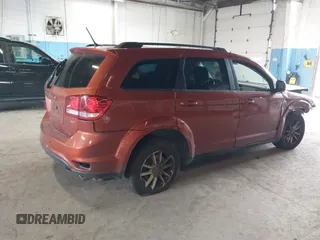 2014 Dodge Journey SXT z VIN 3C4PDDBG7ET173514, wystawiony jako IAAI lot #42305881 z przebiegiem 208 577 mil mil oraz . Historia ofert i sprzedaży dostępna na DreamBid. Obrazek 4.