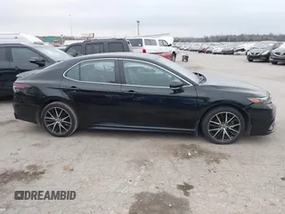 2023 Toyota Camry SE with VIN 4T1G11AK7PU123665, listed as a IAAI auction lot 41142628 with 67,294 mi miles and . Bid and sale history available at DreamBid. Image 13.