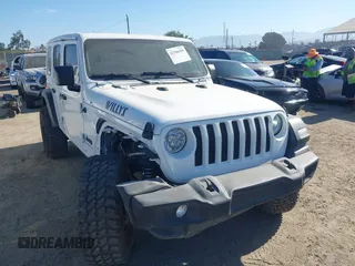 2023 Jeep Wrangler Willys with VIN 1C4HJXDG0PW638871, listed as a IAAI auction lot 42700599 with 16,171 mi miles and . Bid and sale history available at DreamBid. Image 1.