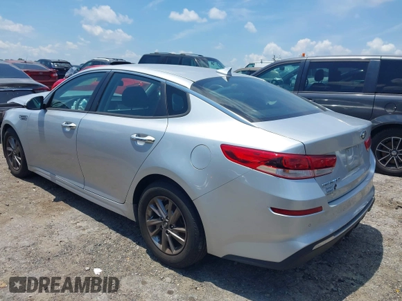 2019 Kia Optima LX with VIN 5XXGT4L3XKG345802, listed as a IAAI auction lot 42609317 with 74,664 mi miles and . Bid and sale history available at DreamBid. Image 3.