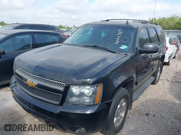 2012 Chevrolet Tahoe LT with VIN 1GNSKBE07CR161461, listed as a IAAI auction lot 42195737 with 210,890 mi miles and . Bid and sale history available at DreamBid. Image 2.