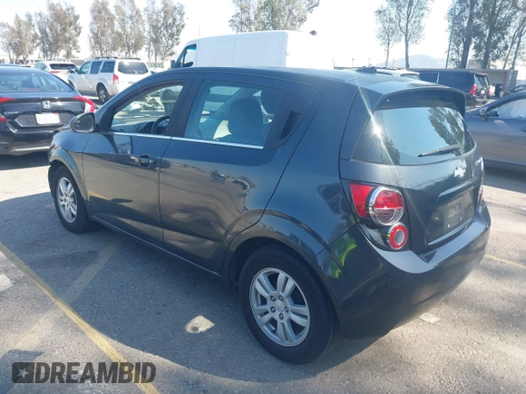 2014 Chevrolet Sonic LT with VIN 1G1JC6SG4E4118781, listed as a IAAI auction lot 41862192 with 124,375 mi miles. Bid and sale history available at carsss.com. Image 3.