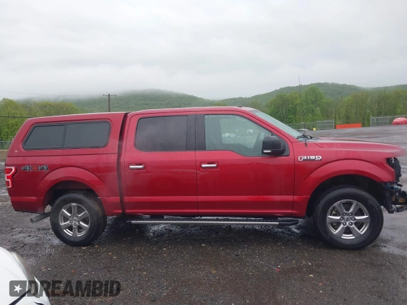 2018 Ford F-150 XL z VIN 1FTEW1EP4JFA70891, wystawiony jako IAAI lot #42219490 z przebiegiem 106 736 mil mil oraz . Historia ofert i sprzedaży dostępna na DreamBid. Obrazek 14.