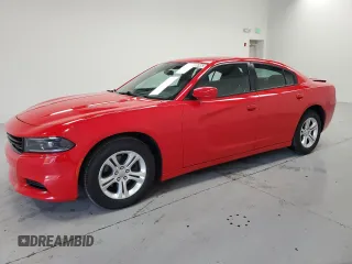 2022 Dodge Charger SXT with VIN 2C3CDXBG6NH165787, listed as a Copart auction lot 55649795 with 82,685 mi miles and Clean Title. Bid and sale history available at DreamBid. Image 1.
