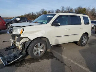 2014 Honda Pilot Touring with VIN 5FNYF4H90EB045332, listed as a Copart auction lot 84977584 with 120,248 mi miles and Salvage Title. Bid and sale history available at DreamBid. Image 1.