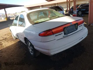 1998 Mercury Mystique z VIN 1MELM6539WK602026, wystawiony jako IAAI lot #41586256 z przebiegiem 134 707 mil mil oraz . Historia ofert i sprzedaży dostępna na DreamBid. Obrazek 3.