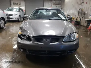 2000 Hyundai Elantra GLS z VIN KMHJF35F1YU995390, wystawiony jako Copart lot #78523024 z przebiegiem 130 349 mil mil oraz Szkoda całkowita • Salvage title. Historia ofert i sprzedaży dostępna na DreamBid. Obrazek 5.