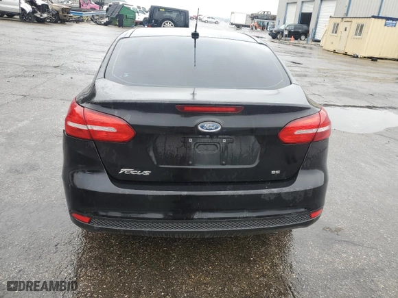 2017 Ford Focus SE with VIN 1FADP3F21HL249544, listed as a Copart auction lot 79911834 with 96,873 mi miles and Salvage Title. Bid and sale history available at carsss.com. Image 6.