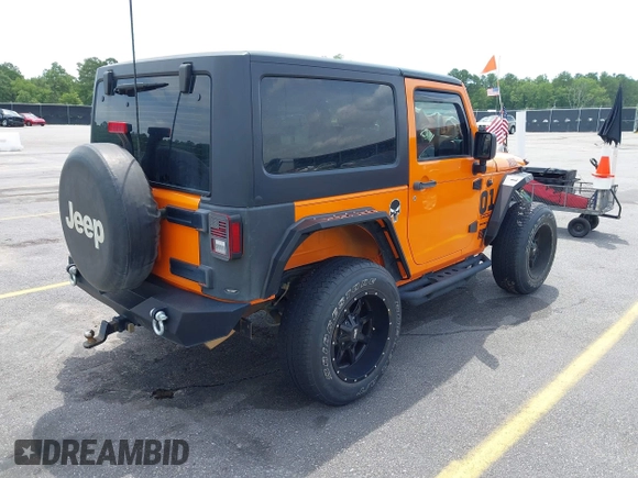 2013 Jeep Wrangler Sport z VIN 1C4AJWAG2DL538526, wystawiony jako IAAI lot #42378501 z przebiegiem 81 709 mil mil oraz . Historia ofert i sprzedaży dostępna na DreamBid. Obrazek 4.