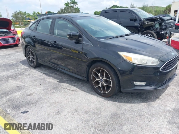 2015 Ford Focus SE with VIN 1FADP3F21FL209221, listed as a IAAI auction lot 42716293 with 100,465 mi miles and . Bid and sale history available at DreamBid. Image 1.