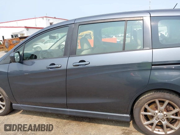 2012 Mazda 5 Touring z VIN JM1CW2CL5C0126744, wystawiony jako IAAI lot #42385667 z przebiegiem 140 150 mil mil oraz . Historia ofert i sprzedaży dostępna na DreamBid. Obrazek 14.