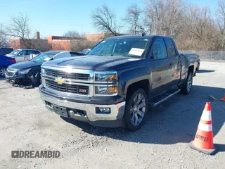 2014 Chevrolet Silverado 1500 LT with VIN 1GCVKREC0EZ377177, listed as a IAAI auction lot 41683600 with 148,672 mi miles and . Bid and sale history available at DreamBid. Image 2.