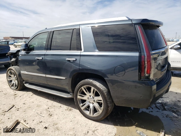 2020 Cadillac Escalade Luxury with VIN 1GYS3BKJ7LR178967, listed as a Copart auction lot 48310755 with 94,579 mi miles and Salvage Title. Bid and sale history available at carsss.com. Image 2.