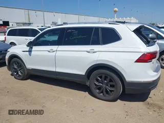 2022 Volkswagen Tiguan SE with VIN 3VV3B7AX7NM032705, listed as a IAAI auction lot 41987713 with 34,010 mi miles and . Bid and sale history available at DreamBid. Image 14.