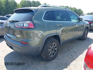 2019 Jeep Cherokee Latitude with VIN 1C4PJLCB9KD109451, listed as a IAAI auction lot 39941419 with 131,236 mi miles. Bid and sale history available at carsss.com. Image 4.