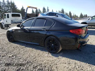 2018 BMW M5 z VIN WBSJF0C57JB283361, wystawiony jako Copart lot #65352164 z przebiegiem Nie podano mil oraz Szkoda całkowita • Salvage title. Historia ofert i sprzedaży dostępna na DreamBid. Obrazek 2.