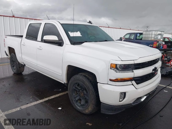 2018 Chevrolet Silverado 1500 LT with VIN 3GCUKREC5JG595959, listed as a IAAI auction lot 41608507 with 117,824 mi miles. Bid and sale history available at carsss.com. Image 1.