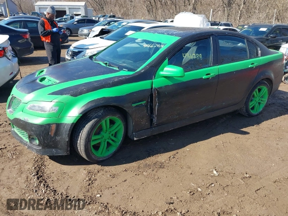 2009 Pontiac G8 with VIN 6G2ER57739L172831, listed as a IAAI auction lot 41662818 with 145,900 mi miles. Bid and sale history available at carsss.com. Image 2.