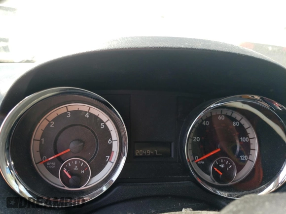 2016 Dodge Grand Caravan SE with VIN 2C4RDGBG3GR209697, listed as a Copart auction lot 54839565 with 204,947 mi miles and Salvage Title. Bid and sale history available at DreamBid. Image 9.