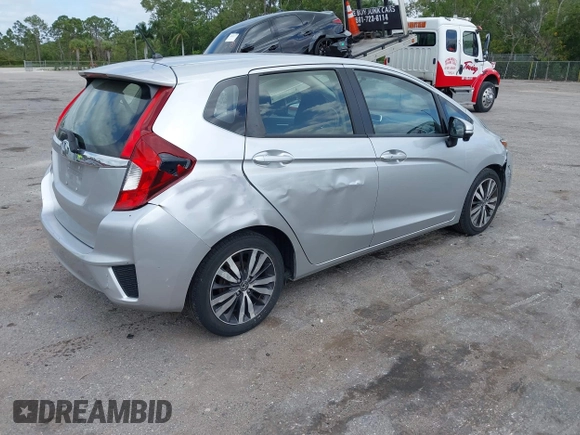 2016 Honda Fit EX with VIN JHMGK5H74GX000882, listed as a IAAI auction lot 42091641 with 64,210 mi miles and . Bid and sale history available at DreamBid. Image 4.